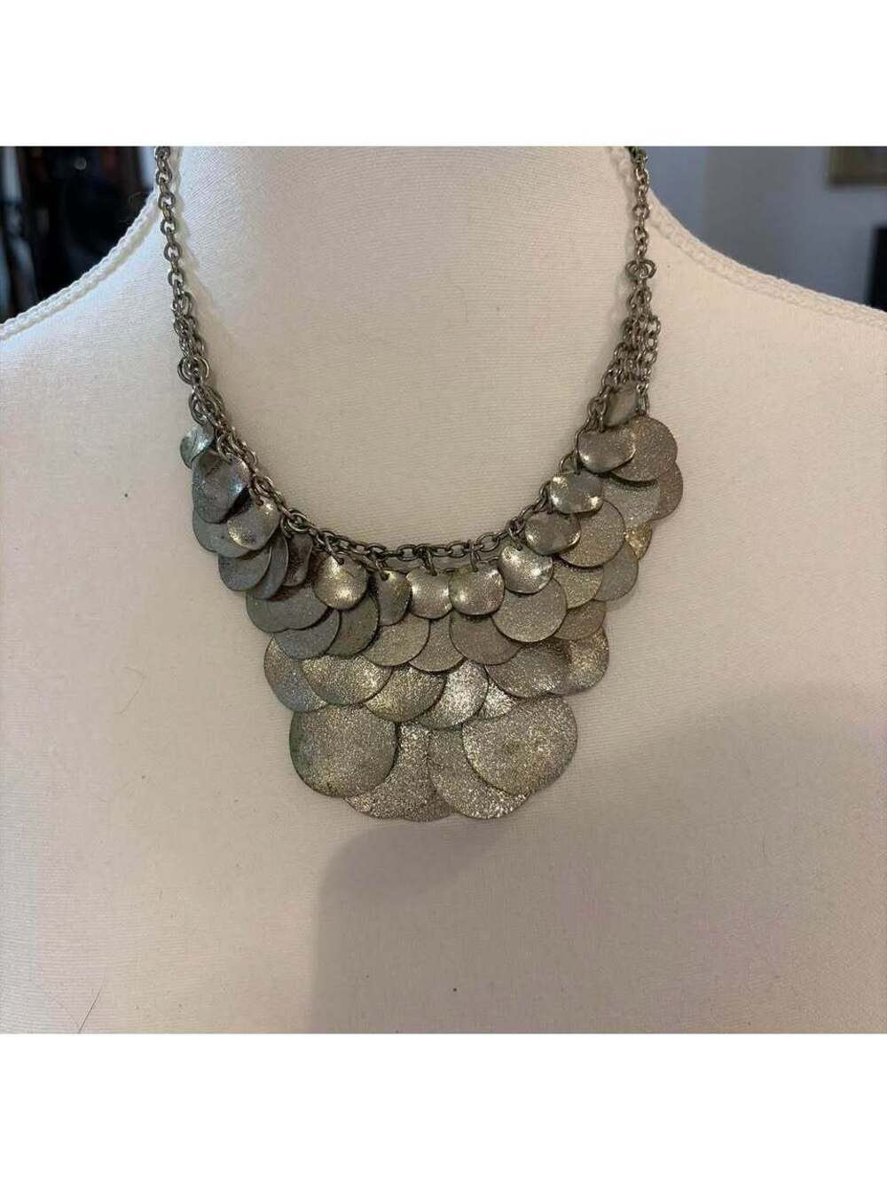 Silver metallic coin necklace with layered circular discs #statement #layered